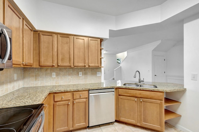 kitchen featuring decorative backsplash, stainless steel dishwasher, open shelves, and a sink