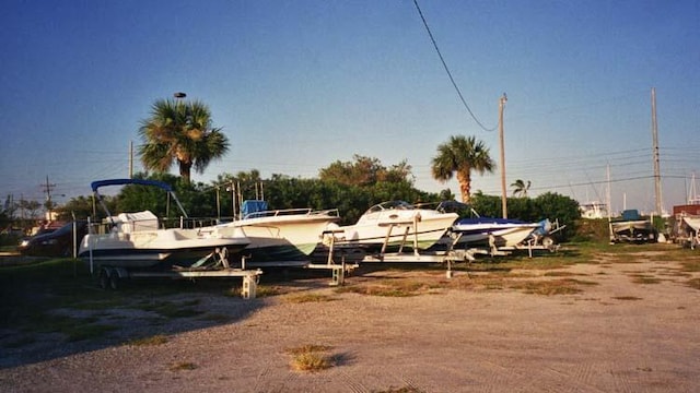 view of community with a dock