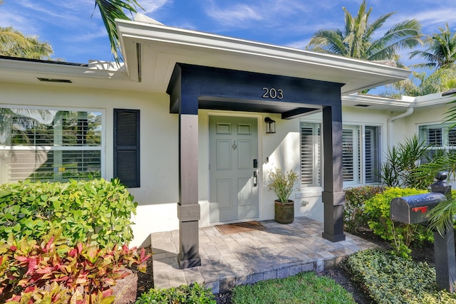 203 NW 15th St, Delray Beach, FL 33444 - property entrance featuring stucco siding