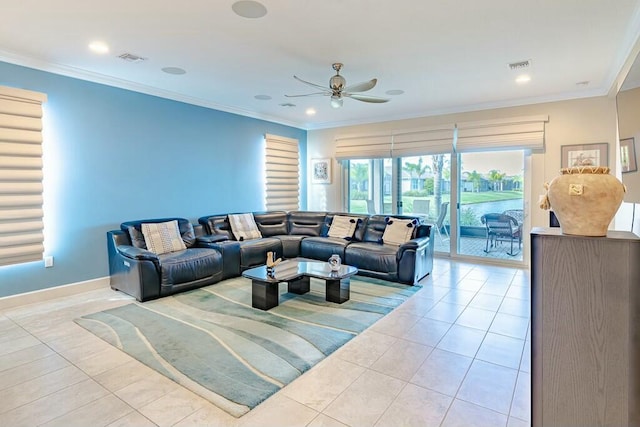 living area featuring tile patterned flooring, ceiling fan, visible vents, and ornamental molding