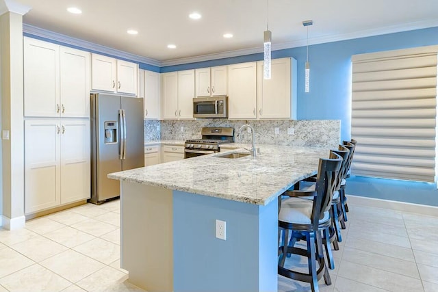 kitchen featuring a peninsula, a sink, stainless steel appliances, crown molding, and backsplash