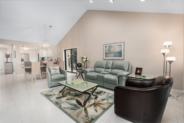 living area featuring a chandelier, high vaulted ceiling, recessed lighting, baseboards, and marble finish floor