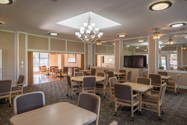 dining area with a chandelier and ornamental molding