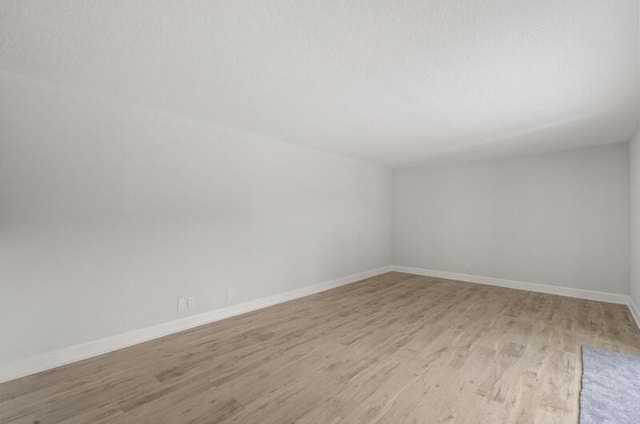 empty room featuring light hardwood / wood-style floors