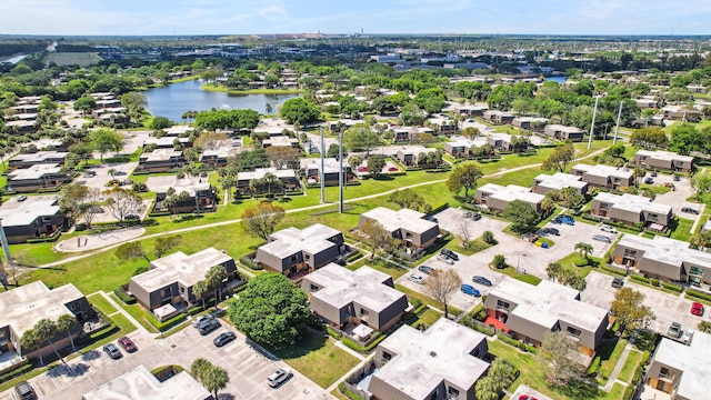 drone / aerial view with a water view