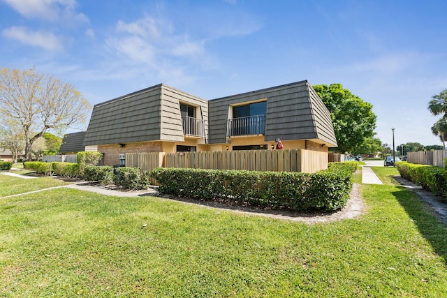 exterior space featuring a front lawn