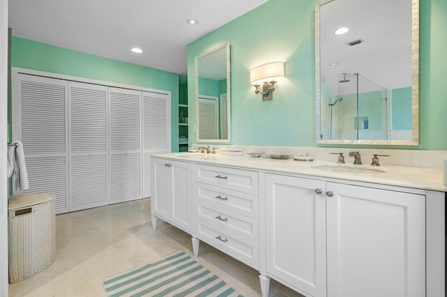 bathroom featuring tile patterned floors and vanity