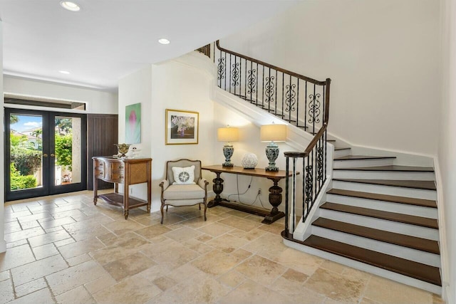 staircase featuring french doors