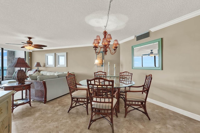 tiled dining space featuring ceiling fan, ornamental molding, and a textured ceiling