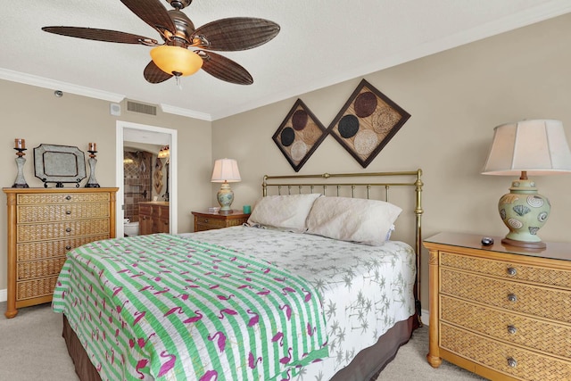 carpeted bedroom with connected bathroom, crown molding, and ceiling fan