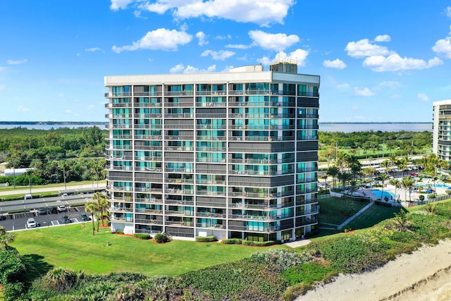 view of building exterior featuring a water view