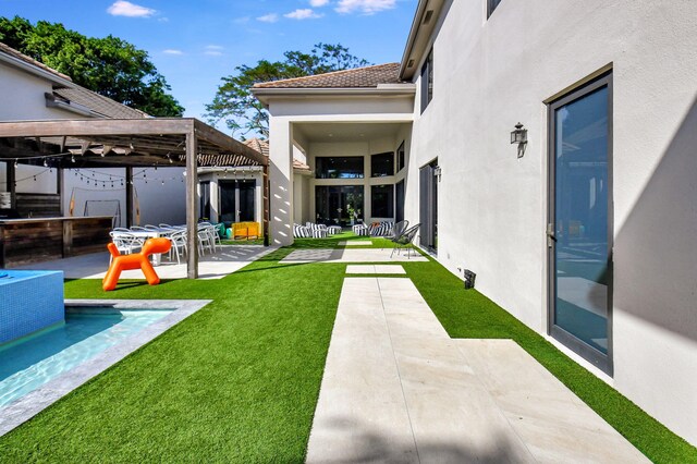 view of yard featuring a patio and a gazebo