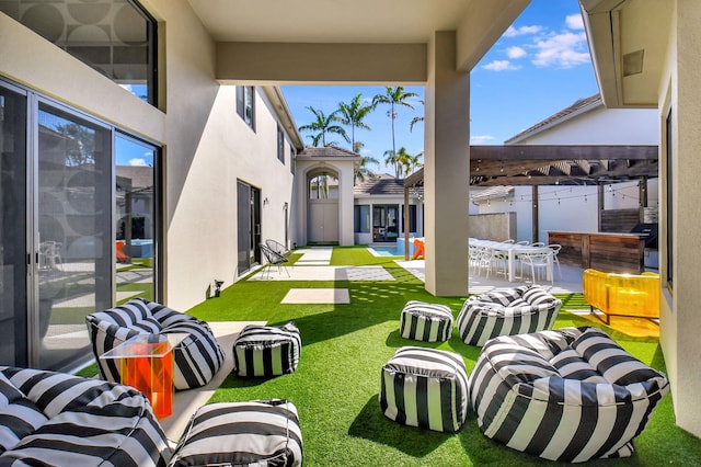 view of yard with a patio area, a pergola, and outdoor dining space