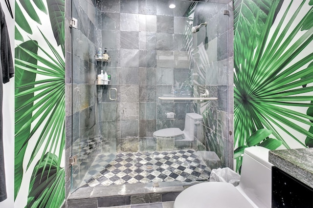 bathroom featuring a shower stall and toilet