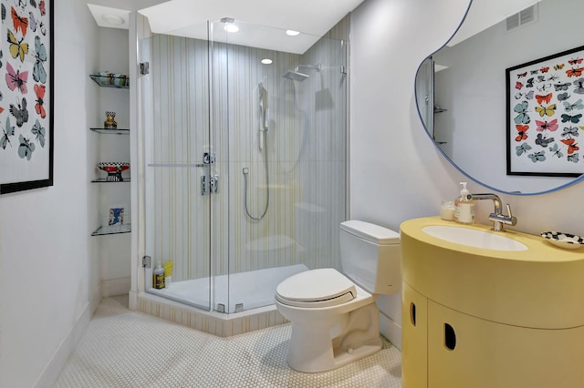 full bath with visible vents, toilet, a stall shower, vanity, and tile patterned flooring