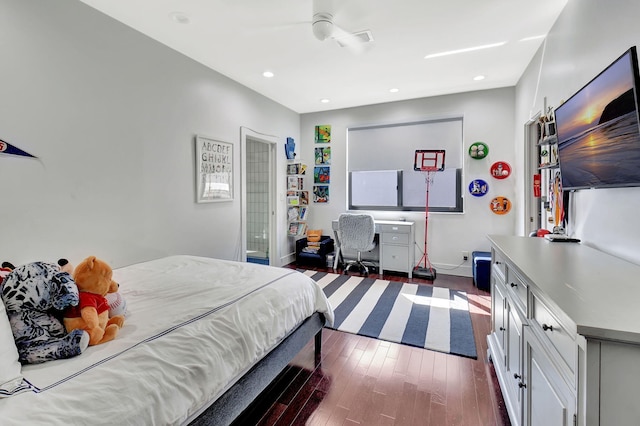 bedroom featuring baseboards, dark wood-style flooring, and recessed lighting