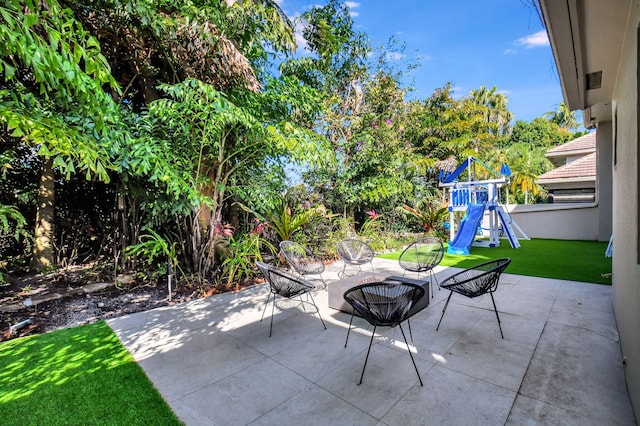 view of patio / terrace featuring a playground