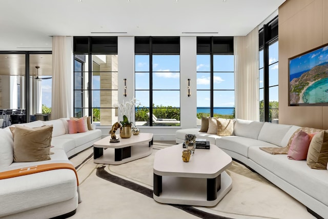 living room featuring a water view