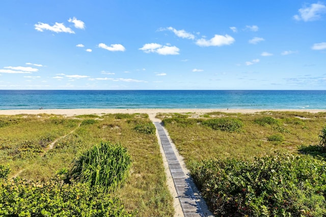 property view of water featuring a beach view