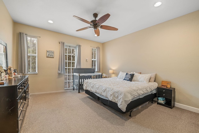 bedroom with recessed lighting, baseboards, ceiling fan, and light colored carpet