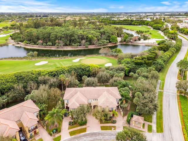 aerial view with a water view and golf course view