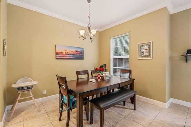 dining area featuring ornamental molding, a chandelier, baseboards, and light tile patterned floors