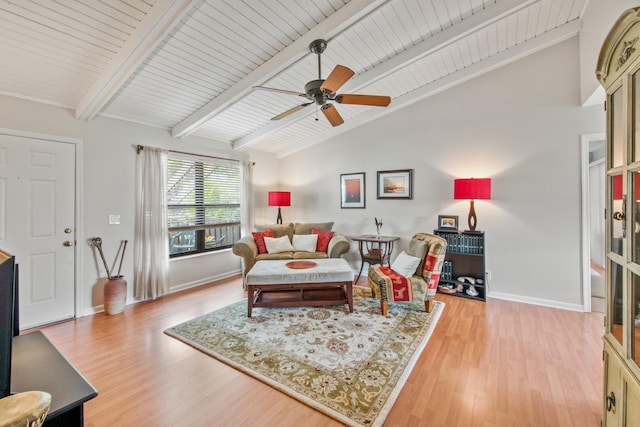 living room with light wood-style flooring, lofted ceiling with beams, baseboards, and a ceiling fan