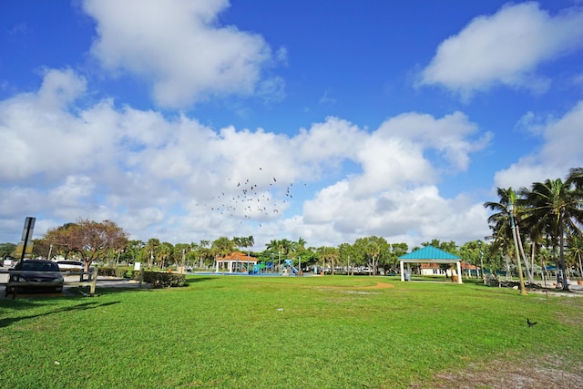 view of community featuring a yard and a gazebo