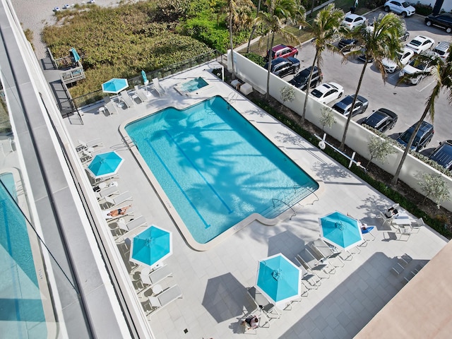 view of swimming pool with a patio