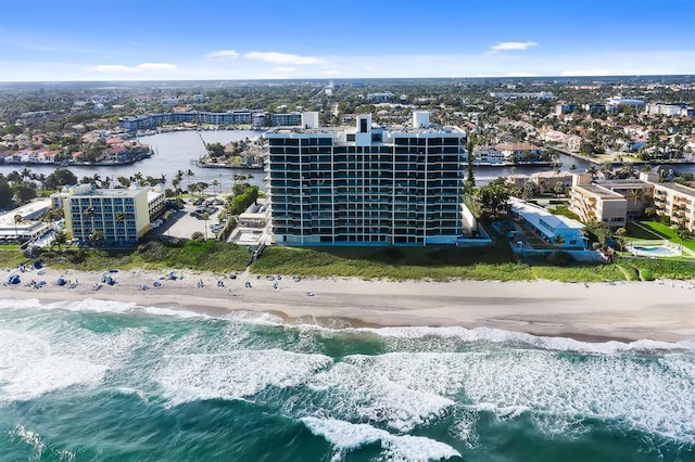 bird's eye view featuring a beach view and a water view