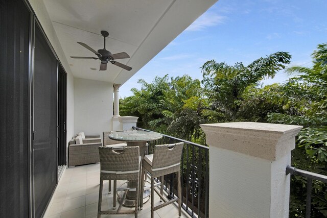 balcony featuring a ceiling fan