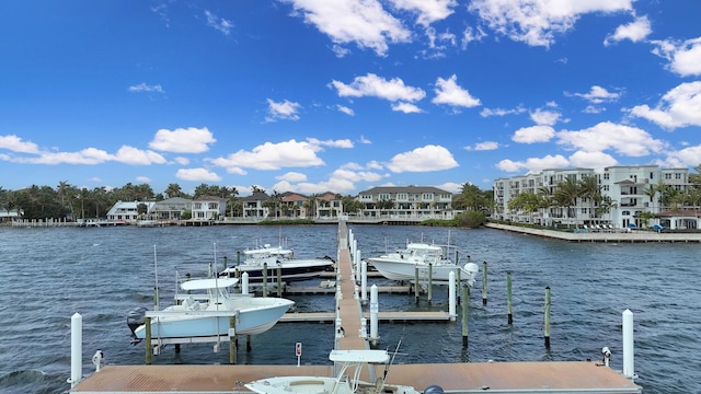 view of dock featuring a water view and boat lift