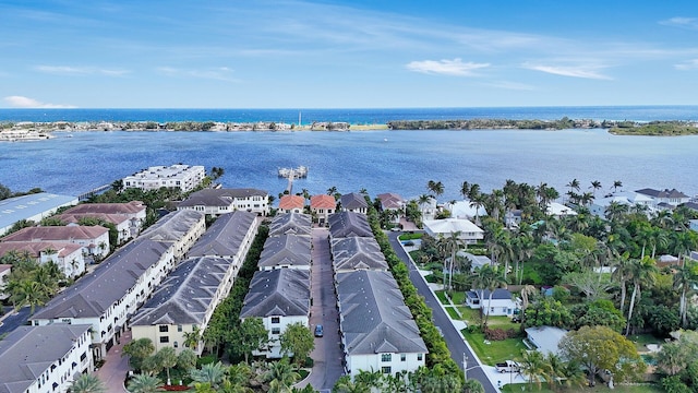 aerial view with a residential view and a water view