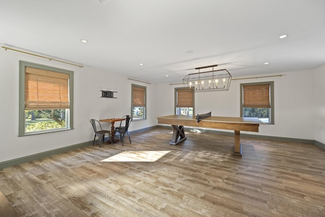 game room with hardwood / wood-style flooring