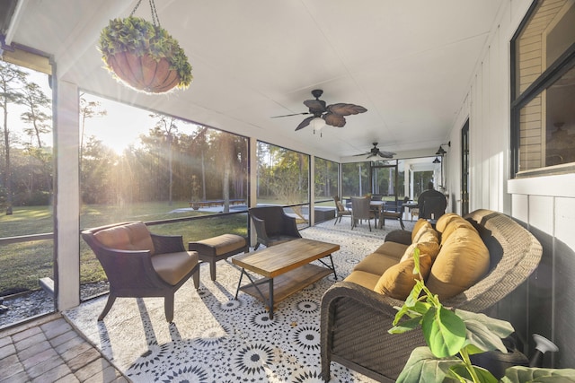 sunroom / solarium with ceiling fan