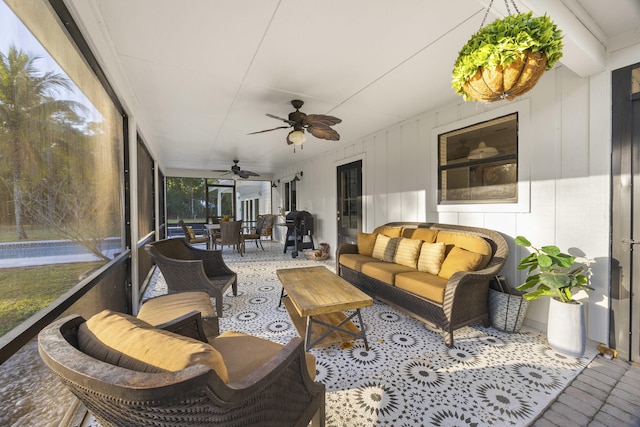 sunroom / solarium with ceiling fan