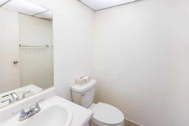 bathroom with sink and toilet