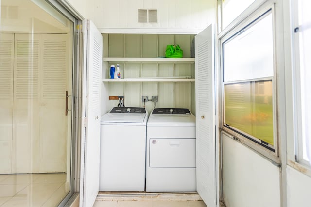 laundry area featuring separate washer and dryer