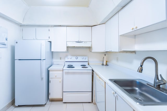 kitchen featuring white cabinetry, sink, white appliances, and light tile patterned floors