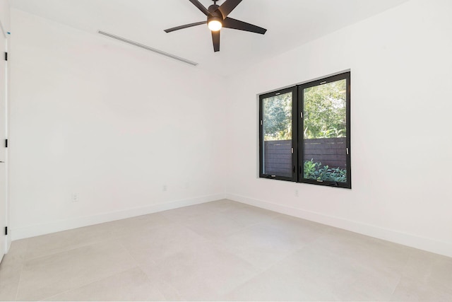 spare room with ceiling fan