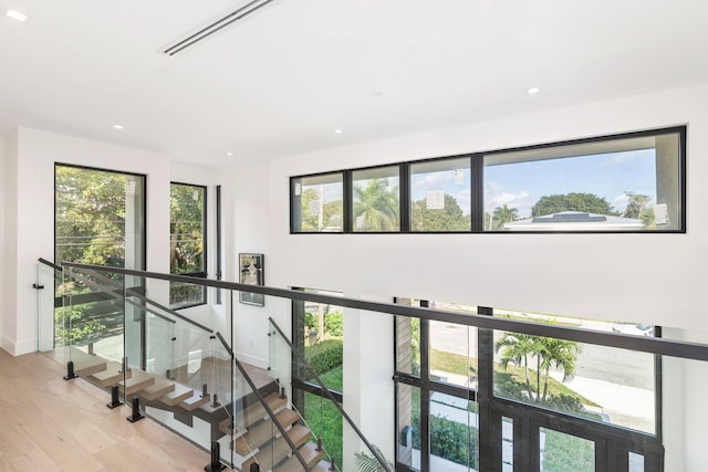 hall with light hardwood / wood-style floors