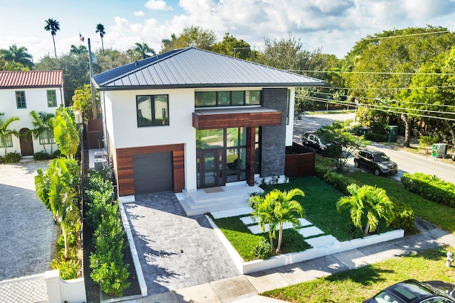 contemporary home featuring a garage