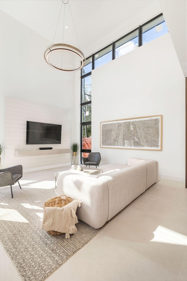 carpeted living room with a wall of windows