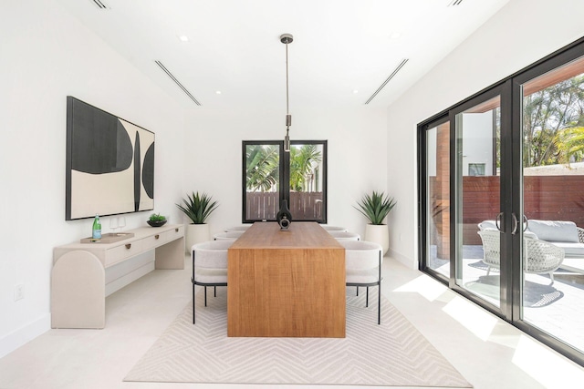 dining area with french doors and plenty of natural light