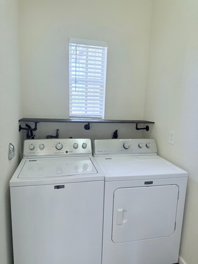 laundry area featuring separate washer and dryer