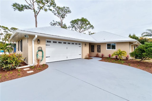 ranch-style house featuring a garage