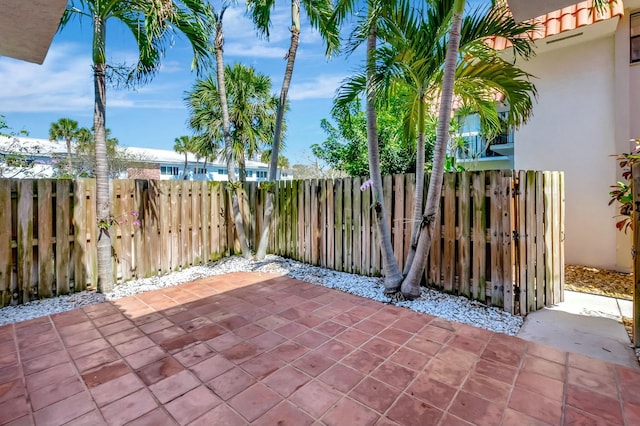 view of patio featuring fence