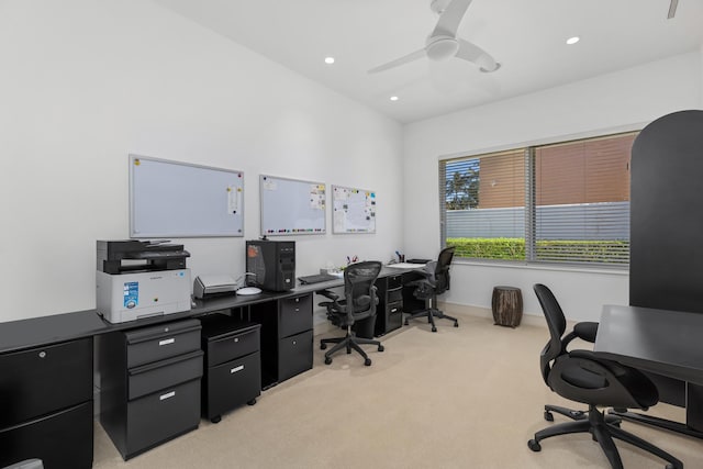 office area with light colored carpet and ceiling fan