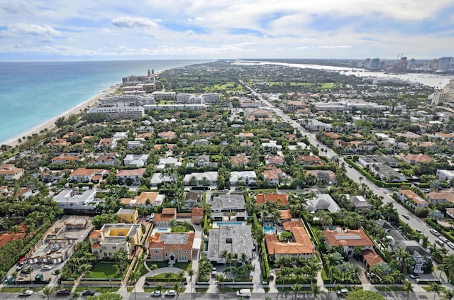 aerial view featuring a water view and a beach view