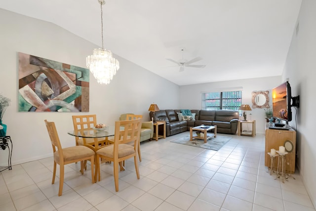 tiled dining room featuring lofted ceiling and ceiling fan with notable chandelier